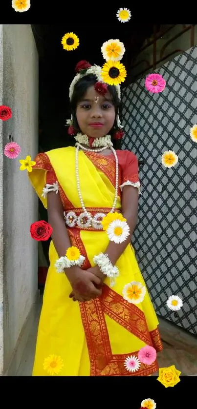 Girl in vibrant yellow traditional attire with floral garlands.