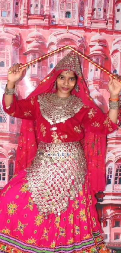 Woman in vibrant traditional attire dancing against a heritage background.