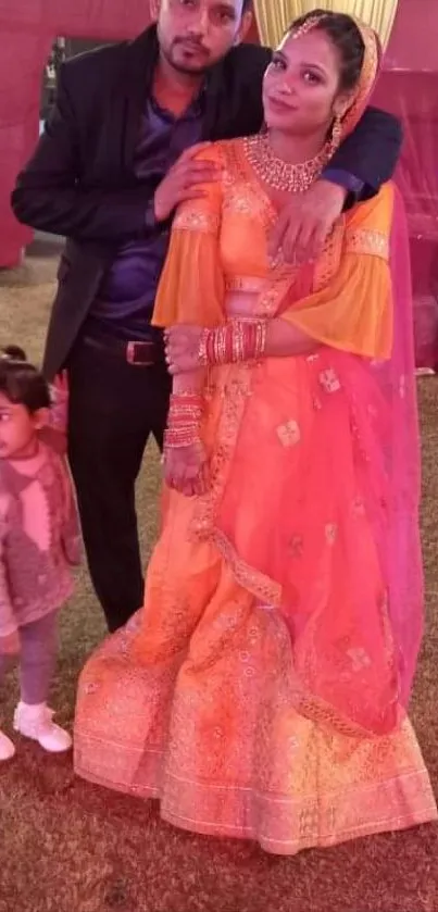 Vibrant Indian family portrait in colorful traditional attire during a festive celebration.