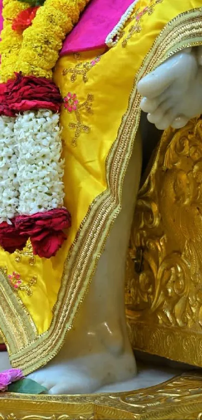 Close-up of vibrant traditional leg art in gold and floral hues.