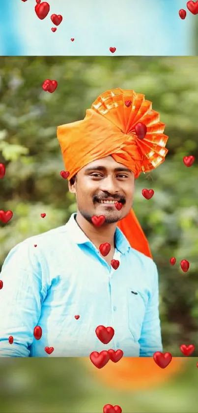 Person in vibrant orange turban with red hearts wallpaper.