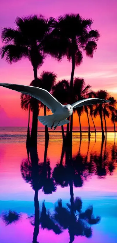 Vibrant tropical sunset with palms reflecting on water.
