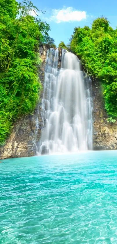 Lush waterfall cascading into a turquoise pool amidst tropical greenery.