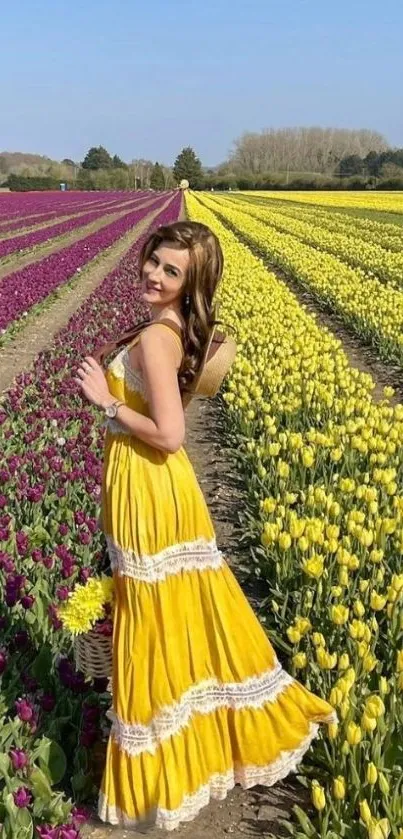 Woman in a yellow dress standing in a colorful tulip field.