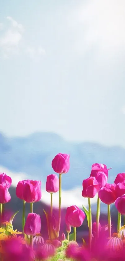 Pink tulips bloom before a majestic mountain and clear sky.