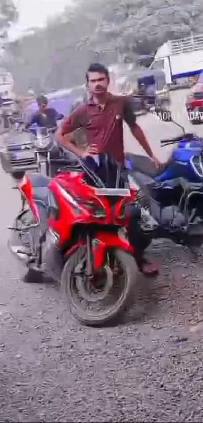 Red and blue motorcycles with a city backdrop.