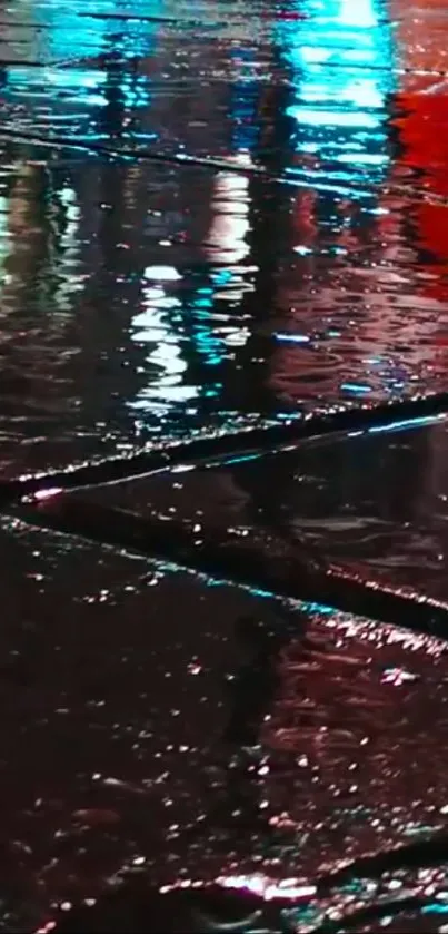 Colorful city night reflection on wet street pavement.