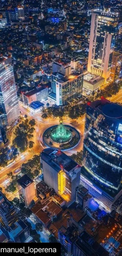 Aerial view of a vibrant cityscape at night with illuminated skyscrapers.