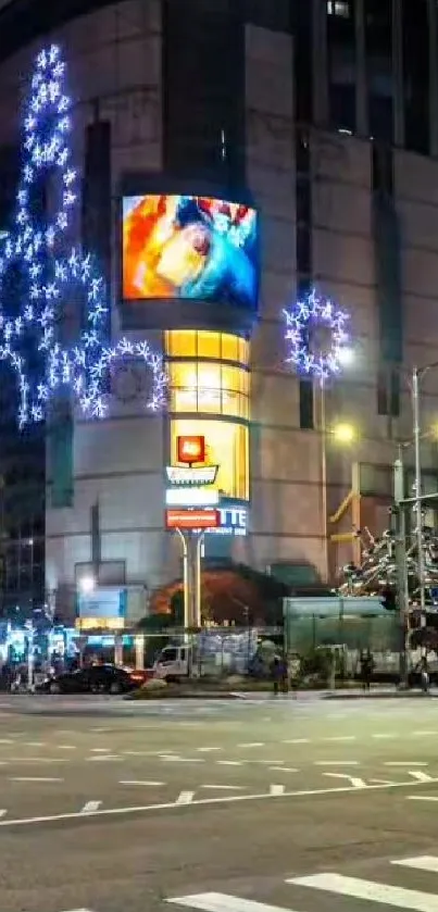 Urban night scene with neon lights and vibrant city architecture.
