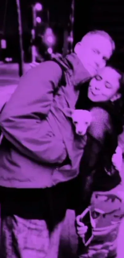 Couple embracing in a pink urban night scene with a puppy.