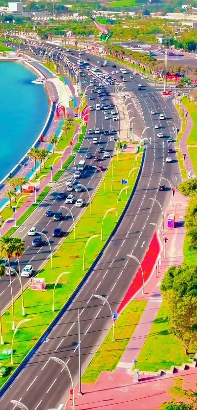 Coastal highway with vibrant skyline and greenery, perfect mobile wallpaper.