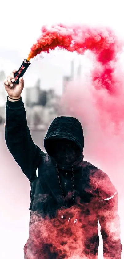 Hooded figure with red smoke bomb in urban setting.