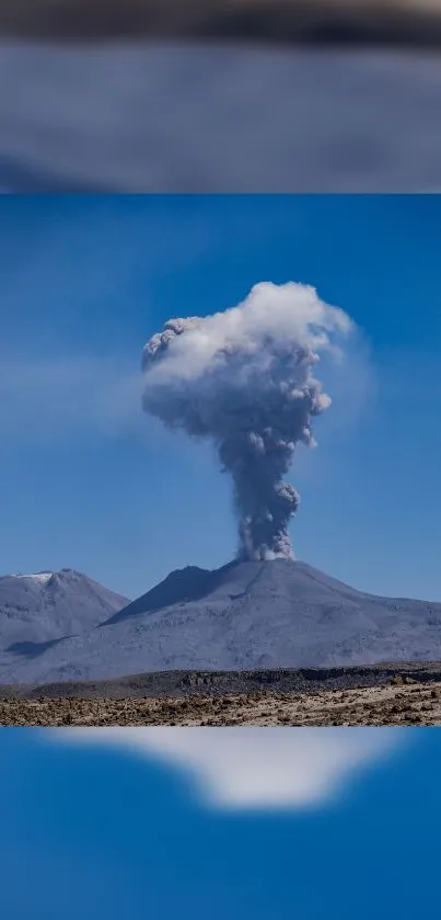 Volcano eruption with blue sky mobile wallpaper.