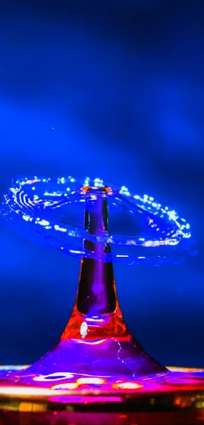 Colorful splash of water art on blue background for mobile wallpaper.