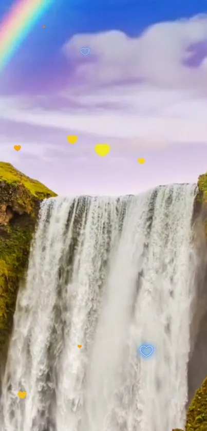 Waterfall with rainbow and lush greenery under purple sky.