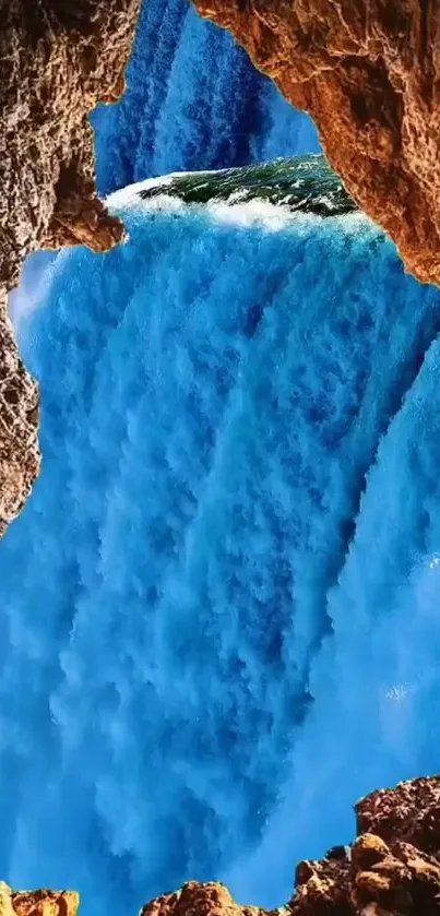 Vibrant blue waterfall framed by rocky formations.