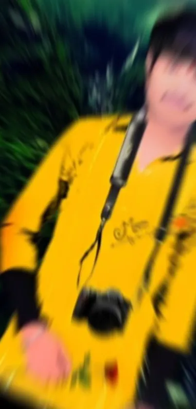 Blurry image with a dominant yellow shirt and green background.