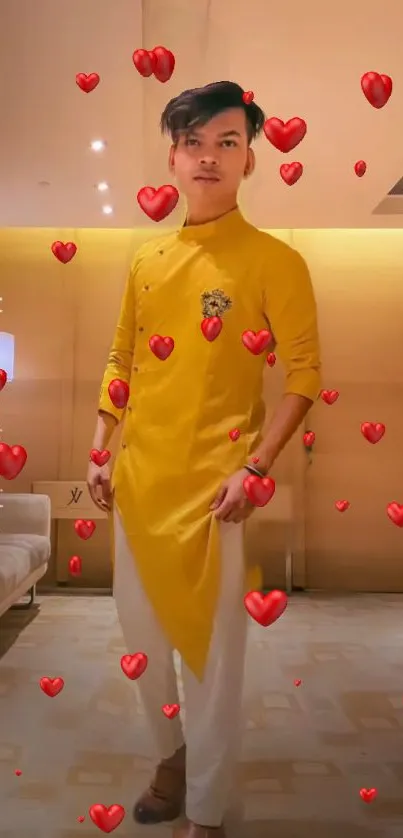 Man in yellow kurta surrounded by floating red hearts.