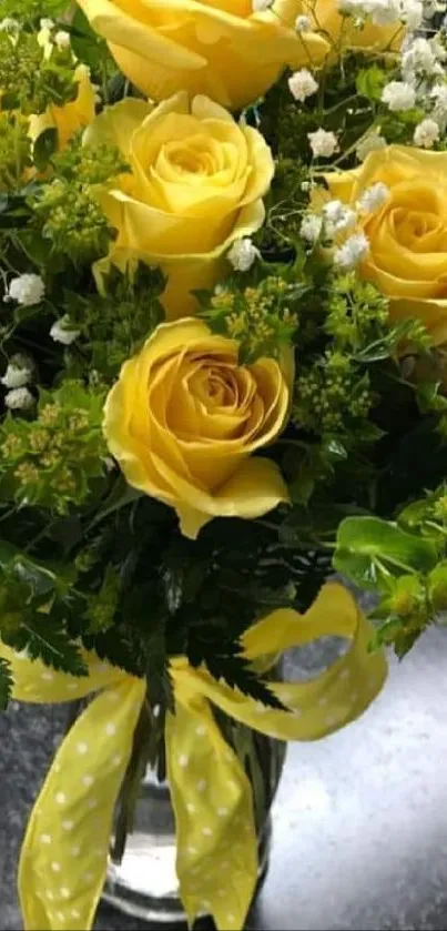 A vibrant bouquet of yellow roses with lush greenery.