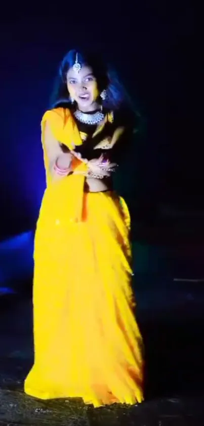 Elegant woman in yellow saree with dark background.