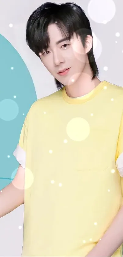 Person in vibrant yellow shirt with pastel background.