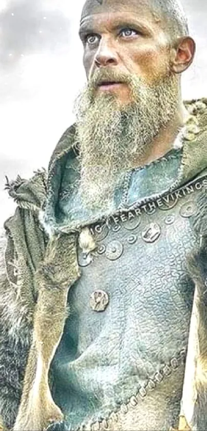 Viking warrior in detailed medieval attire with fur cloak.