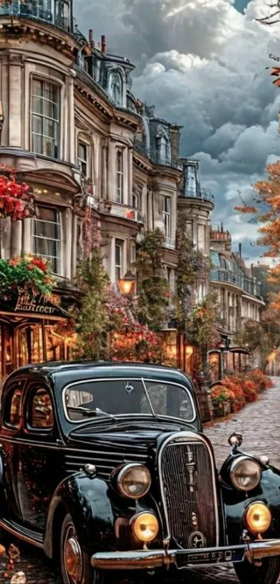 Vintage car on cobblestone street with autumn foliage and historic buildings.