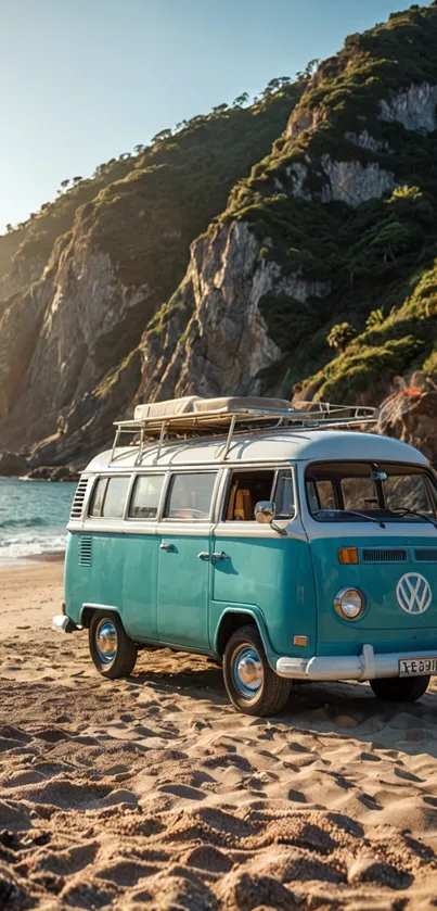 Vintage turquoise van on beach at sunset with scenic mountain backdrop.