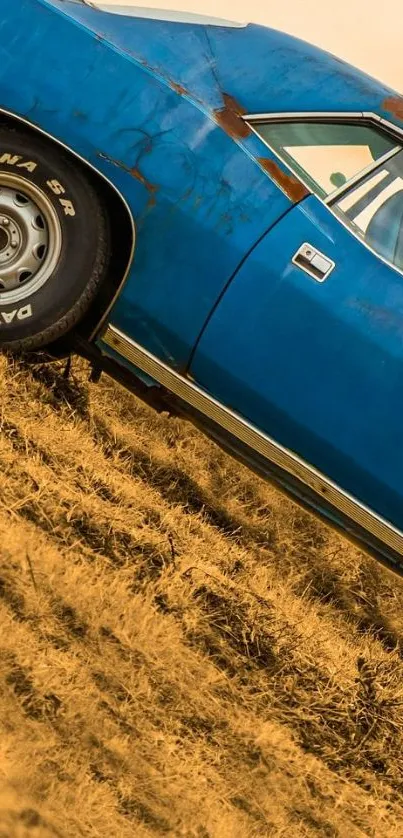 A vintage blue car on a rustic hill with earthy tones and scenic backdrop.