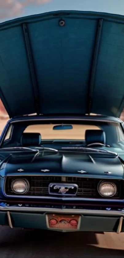 Vintage blue car with open hood on desert road.