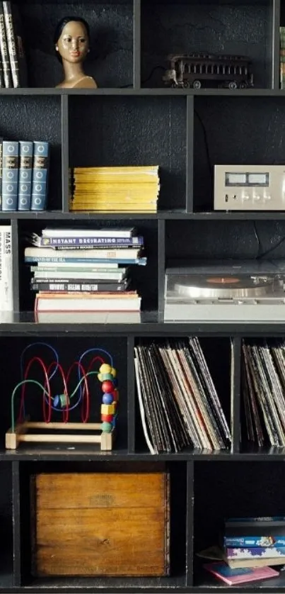 Vintage bookshelf wallpaper with books, vinyl records, and retro decor in black shelves.