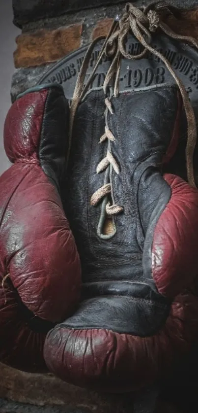 Vintage boxing glove on a brick wall.