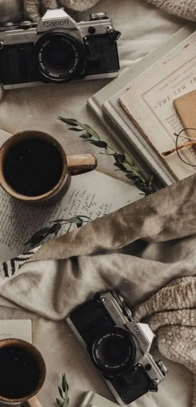 Vintage cameras, coffee cups, and books create a cozy aesthetic.
