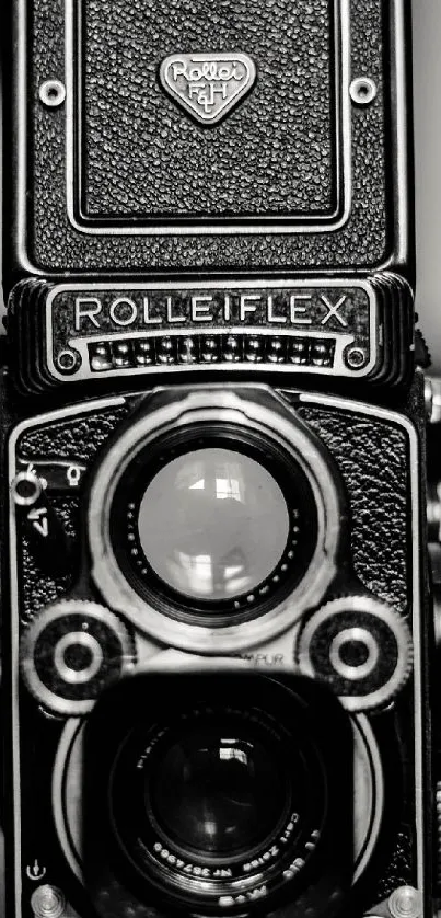 Vintage Rolleiflex camera in black and white.