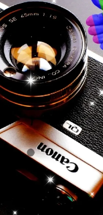 Close-up of vintage camera with colorful accents on a black surface.
