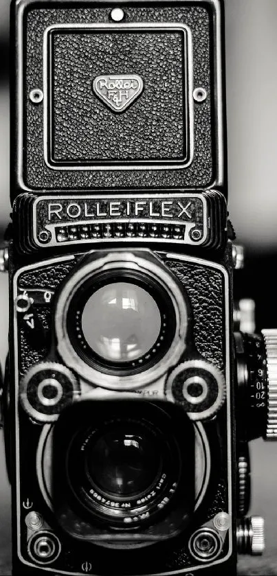 Black and white Rolleiflex vintage camera close-up wallpaper.