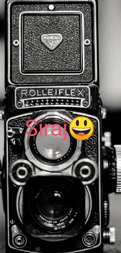 Vintage Rolleiflex camera in black and white, perfect for a retro mobile wallpaper.