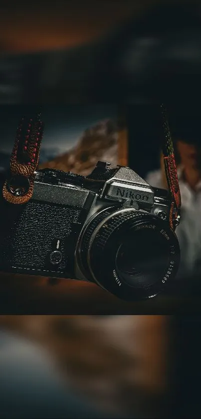 Vintage camera with a dark blurred background.