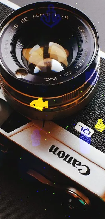 Vintage camera on a dark backdrop mobile wallpaper.