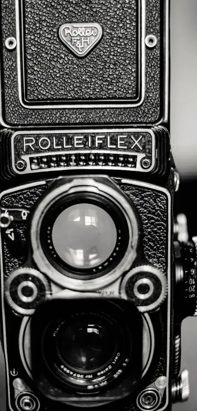 Black and white vintage Rolleiflex camera wallpaper.