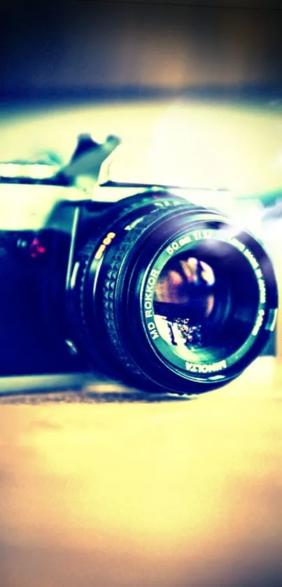 Artistic vintage camera with lens focus, captured in cool tones.