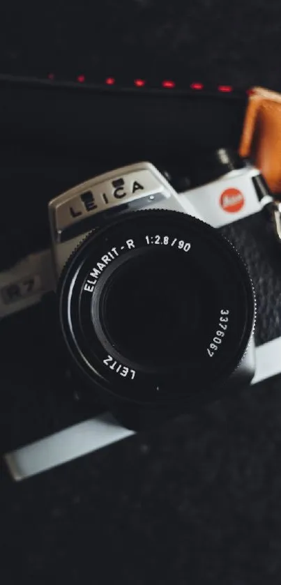 Vintage Leica camera with black and brown details, perfect for mobile wallpaper.