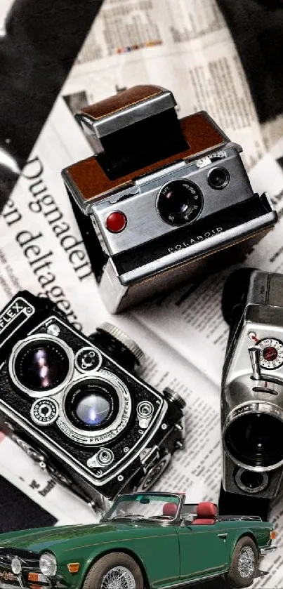 Vintage cameras and green car on newspaper background.
