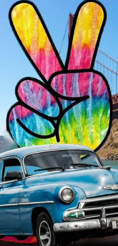 Vintage car with colorful peace sign art in front of landmark bridge.