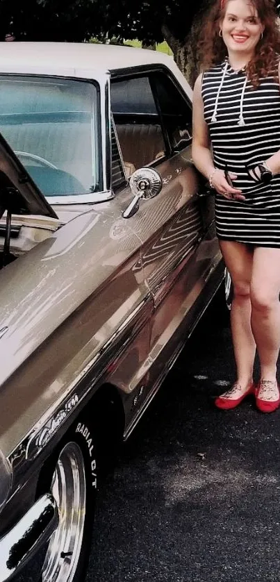 Woman in striped dress with vintage car.