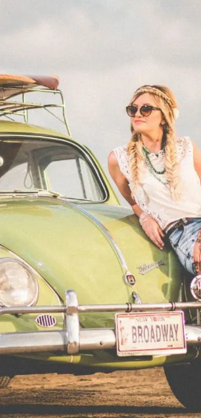 Vintage green car with woman at the beach.