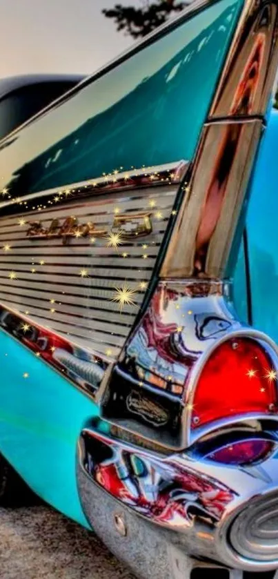 Vintage turquoise car with chrome accents and vibrant details.