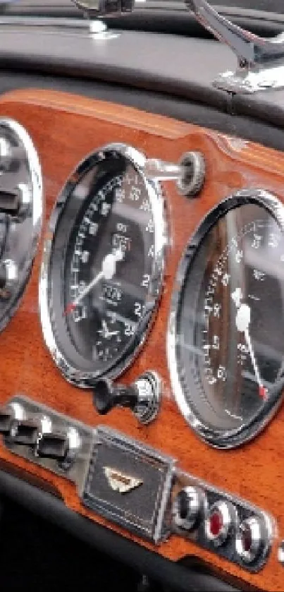 Close-up of a vintage car dashboard with classic instrument panel.