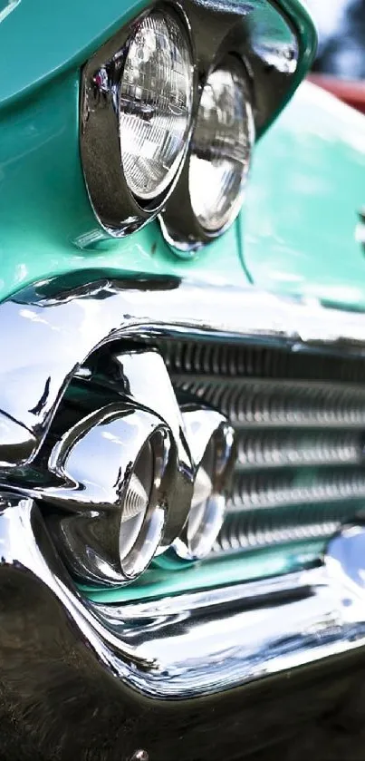 Close-up of a vintage car front with chrome trim.