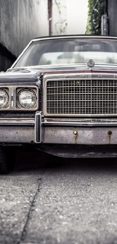 Vintage car parked in a narrow alley with gritty gray textures.